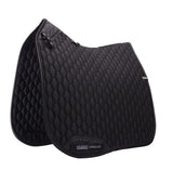 Black quilted saddle pad with a visible brand logo on a white background
